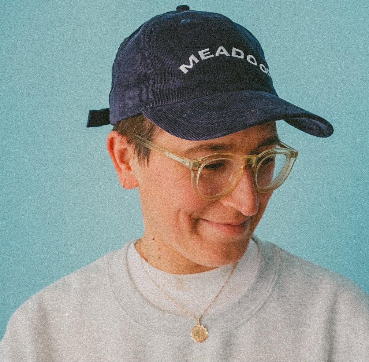 Woman wearing a Beth Mead Women's Football Hat