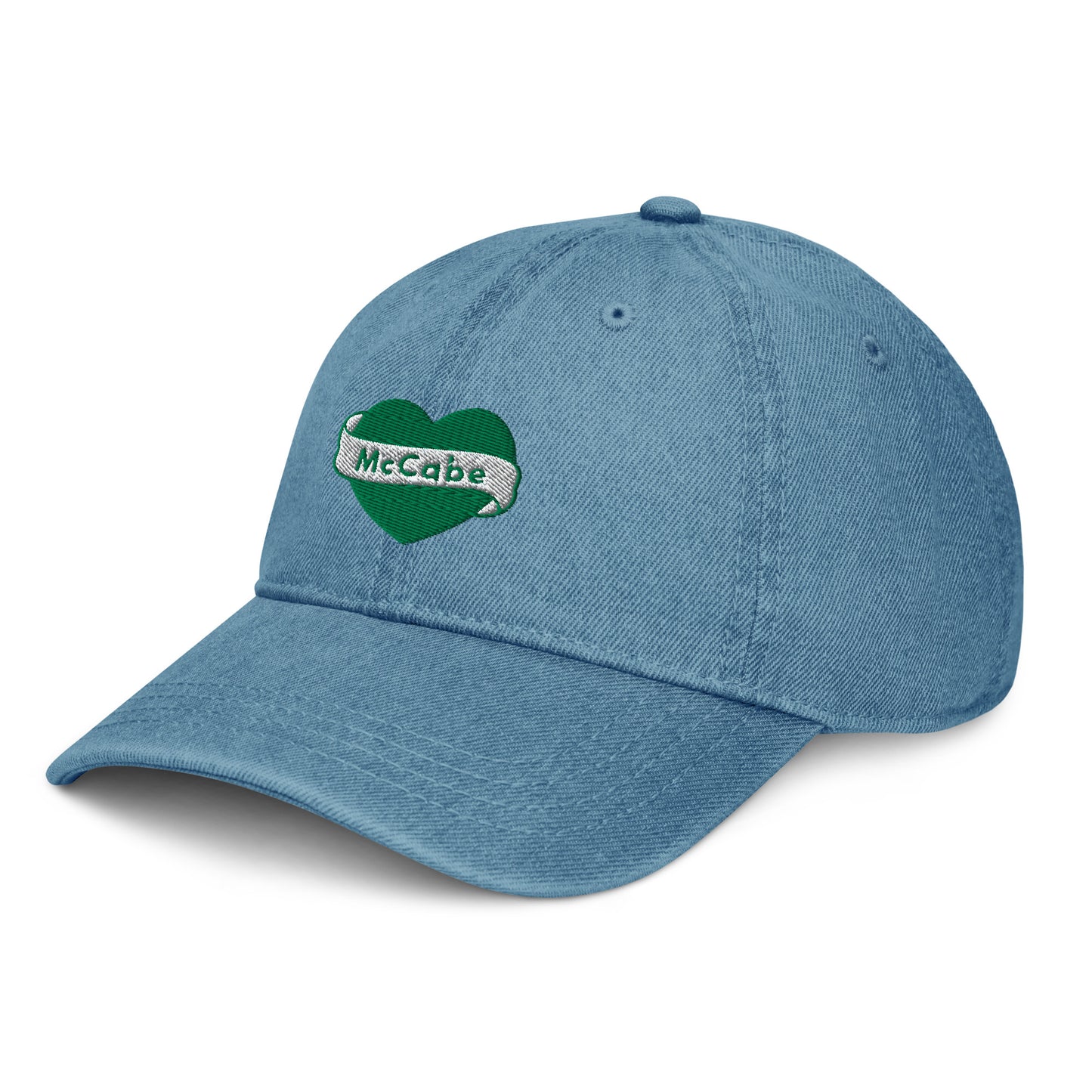 Denim blue hat with Katie McCabe graphic on the front of the hat